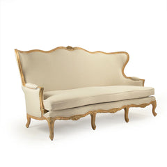 Eloy sofa by Zentique featuring plush upholstery, elegant design, and sturdy wooden legs in a stylish living room setting.