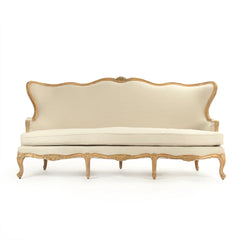 Eloy sofa by Zentique featuring plush upholstery, elegant design, and wooden legs, perfect for stylish living room seating.