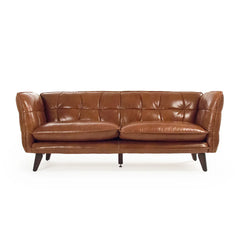 A stylish Liliane sofa by Zentique featuring elegant design and plush upholstery, perfect for modern living rooms.