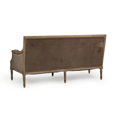 Louis sofa by Zentique featuring elegant design, plush cushions, and wooden legs, perfect for stylish living room decor.