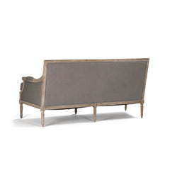 Louis sofa by Zentique featuring elegant upholstery, classic design, and wooden legs, ideal for stylish living room seating.