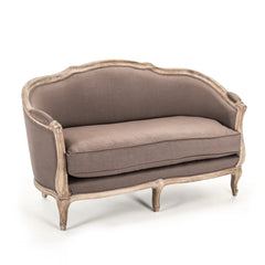Maison Settee in limed grey oak by Zentique, showcasing a stylish sofa with elegant upholstery and wooden legs.