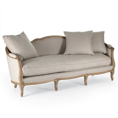 Maison sofa in natural linen by Zentique featuring a modern design with plush cushions and wooden legs.