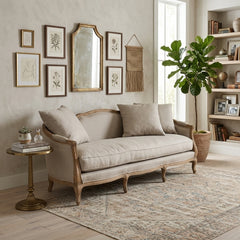 Maison Sofa in natural linen by Zentique featuring a modern design with plush cushions and wooden legs.