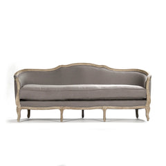 Three-seat Maison sofa by Zentique featuring plush upholstery and elegant design with wooden legs.