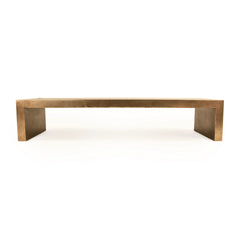 Aristide low coffee table by Zentique featuring a rustic wooden surface and sturdy legs, perfect for living room decor.