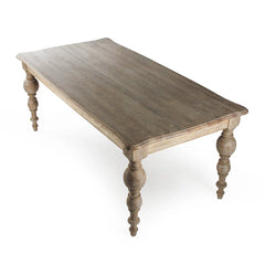 Felicia dining table by Zentique featuring a rustic wooden surface and sturdy legs, ideal for modern and farmhouse dining rooms.