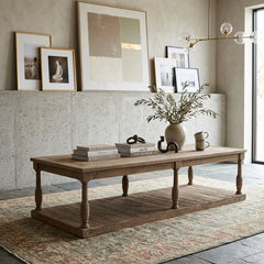 Florent coffee table by Zentique with a rustic wooden finish and sturdy metal legs, perfect for living room decor.