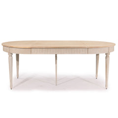 Zentique Martel dining table with wooden surface and elegant design, suitable for modern or traditional dining rooms.