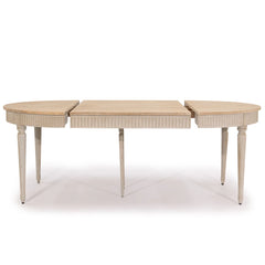 Martel dining table by Zentique featuring a rustic wooden surface and sturdy legs, ideal for modern or farmhouse dining rooms.