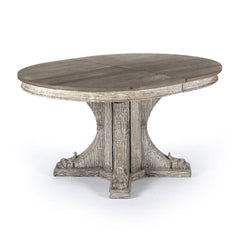 Extendable Terrell Dining Table by Zentique with carved pine wood surface, shown in an elegant dining room setting.
