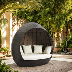 Zuo Modern Marisol Beach outdoor daybed in brown and beige with plush cushions, ideal for garden lounging and outdoor relaxation.