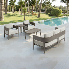 Beige outdoor sofa from Zuo Modern with cushioned seating and armrests, perfect for patio or garden lounging.