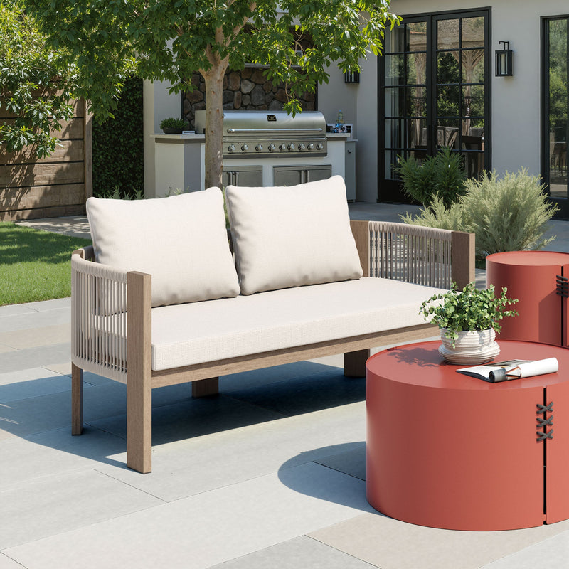 Beige Rebel outdoor sofa by Zuo Modern with plush cushions and modern design, perfect for stylish outdoor seating.