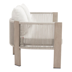 Beige Rebel outdoor sofa by Zuo Modern featuring plush cushions and a sturdy metal frame for stylish outdoor seating.