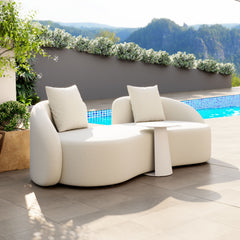 Beige Zuo Modern Sunny Isles outdoor patio love seat in a small space, featuring cushioned seating and modern design.