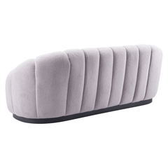 Light gray Bhutan sofa by Zuo Modern, showcasing a contemporary upholstered living room sofa with clean lines and cushioned seating.